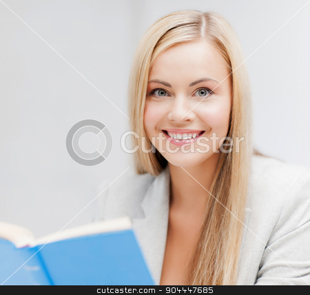 To use this stock image in your creative project, please select the size you need over to the right and click the "Add to Cart" button.
Your downloaded image will come with the Cutcaster watermark removed so don’t worry about the watermark you see on this page. young woman reading book stock photo, picture of smiling young woman reading book by Syda Productions