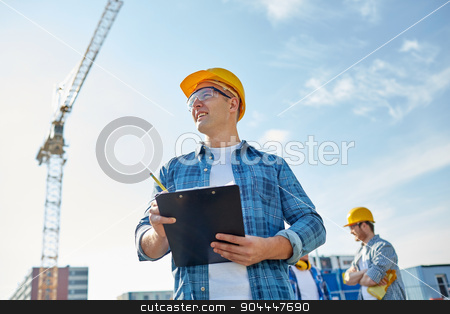 To use this stock image in your creative project, please select the size you need over to the right and click the "Add to Cart" button.
Your downloaded image will come with the Cutcaster watermark removed so don’t worry about the watermark you see on this page. builder in hardhat with clipboard at construction stock photo, business, building, paperwork and people concept - happy builder in hardhat with clipboard and pencil over group of builders at construction site by Syda Productions