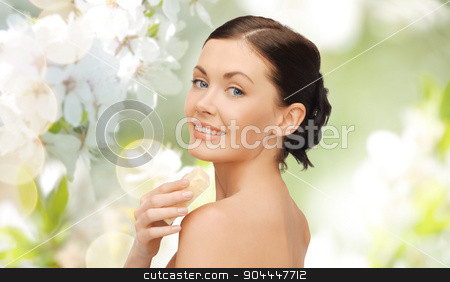 To use this stock image in your creative project, please select the size you need over to the right and click the "Add to Cart" button.
Your downloaded image will come with the Cutcaster watermark removed so don’t worry about the watermark you see on this page. woman with soap bar over cherry blossom background stock photo, people, beauty, hygiene and summer concept - beautiful woman with soap bar over green cherry blossom background by Syda Productions