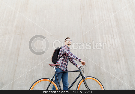 To use this stock image in your creative project, please select the size you need over to the right and click the "Add to Cart" button.
Your downloaded image will come with the Cutcaster watermark removed so don’t worry about the watermark you see on this page. hipster man with fixed gear bike and backpack stock photo, people, travel, tourism, leisure and lifestyle - happy young hipster man with fixed gear bike and backpack on city street by Syda Productions