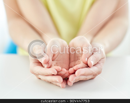 To use this stock image in your creative project, please select the size you need over to the right and click the "Add to Cart" button.
Your downloaded image will come with the Cutcaster watermark removed so don’t worry about the watermark you see on this page. close up of woman and girl with cupped hands stock photo, people, charity, family and advertisement concept - close up of woman and girl holding somethining in cupped hands by Syda Productions