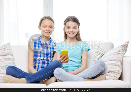 To use this stock image in your creative project, please select the size you need over to the right and click the "Add to Cart" button.
Your downloaded image will come with the Cutcaster watermark removed so don’t worry about the watermark you see on this page. happy girls with smartphone sitting on sofa stock photo, people, children, technology, friends and friendship concept - happy little girls with smartphone sitting on sofa at home by Syda Productions
