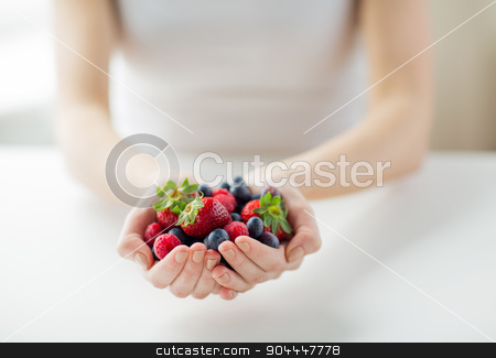 To use this stock image in your creative project, please select the size you need over to the right and click the "Add to Cart" button.
Your downloaded image will come with the Cutcaster watermark removed so don’t worry about the watermark you see on this page. close up of woman hands holding berries stock photo, healthy eating, dieting, vegetarian food and people concept - close up of woman hands holding berries at home by Syda Productions