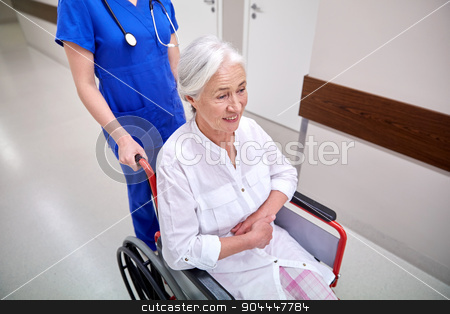 To use this stock image in your creative project, please select the size you need over to the right and click the "Add to Cart" button.
Your downloaded image will come with the Cutcaster watermark removed so don’t worry about the watermark you see on this page. nurse with senior woman in wheelchair at hospital stock photo, medicine, age, support, health care and people concept - nurse taking senior woman patient in wheelchair at hospital corridor by Syda Productions