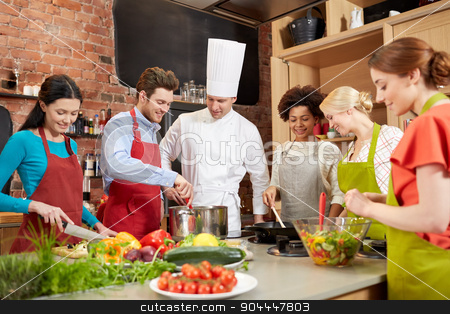 To use this stock image in your creative project, please select the size you need over to the right and click the "Add to Cart" button.
Your downloaded image will come with the Cutcaster watermark removed so don’t worry about the watermark you see on this page. happy friends and chef cook cooking in kitchen stock photo, cooking class, culinary, food and people concept - happy group of friends and male chef cook cooking in kitchen by Syda Productions