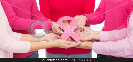 To use this stock image in your creative project, please select the size you need over to the right and click the "Add to Cart" button.
Your downloaded image will come with the Cutcaster watermark removed so don’t worry about the watermark you see on this page. close up of women with cancer awareness ribbons stock photo, healthcare, people and medicine concept - close up of women in blank shirts with pink breast cancer awareness ribbon over white background by Syda Productions
