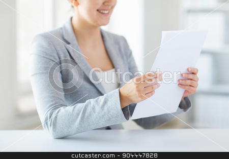 To use this stock image in your creative project, please select the size you need over to the right and click the "Add to Cart" button.
Your downloaded image will come with the Cutcaster watermark removed so don’t worry about the watermark you see on this page. close up of woman reading papers or tax report stock photo, business, finance and people concept - close up of woman reading papers or tax report at office by Syda Productions