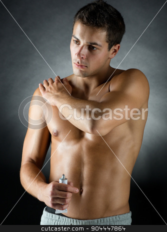 To use this stock image in your creative project, please select the size you need over to the right and click the "Add to Cart" button.
Your downloaded image will come with the Cutcaster watermark removed so don’t worry about the watermark you see on this page. young male bodybuilder applying pain relief gel stock photo, sport, bodybuilding, medicine and people concept - young man standing over black background and applying pain relief gel on his shoulder by Syda Productions