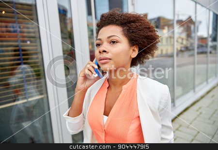 To use this stock image in your creative project, please select the size you need over to the right and click the "Add to Cart" button.
Your downloaded image will come with the Cutcaster watermark removed so don’t worry about the watermark you see on this page. african businesswoman calling on smartphone stock photo, business, communication, technology and people concept - young african american businesswoman calling on smartphone in city by Syda Productions