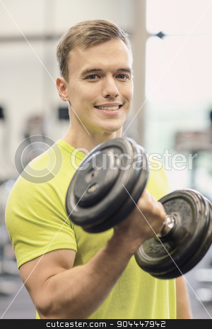 To use this stock image in your creative project, please select the size you need over to the right and click the "Add to Cart" button.
Your downloaded image will come with the Cutcaster watermark removed so don’t worry about the watermark you see on this page. smiling man with dumbbell in gym stock photo, sport, fitness, lifestyle and people concept - smiling man with dumbbell in gym by Syda Productions