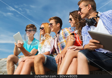 To use this stock image in your creative project, please select the size you need over to the right and click the "Add to Cart" button.
Your downloaded image will come with the Cutcaster watermark removed so don’t worry about the watermark you see on this page. group of smiling friends with tablet pc outdoors stock photo, friendship, leisure, summer, technology and people concept - group of smiling friends with tablet pc computer sitting outdoors by Syda Productions
