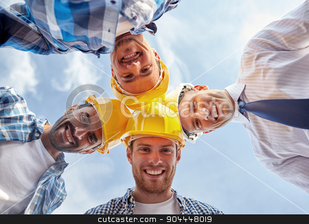 To use this stock image in your creative project, please select the size you need over to the right and click the "Add to Cart" button.
Your downloaded image will come with the Cutcaster watermark removed so don’t worry about the watermark you see on this page. close up of builders wearing hardhats in circle stock photo, business, building, partnership, construction and people concept - close up of smiling builders and architect in hardhats in circle outdoors by Syda Productions