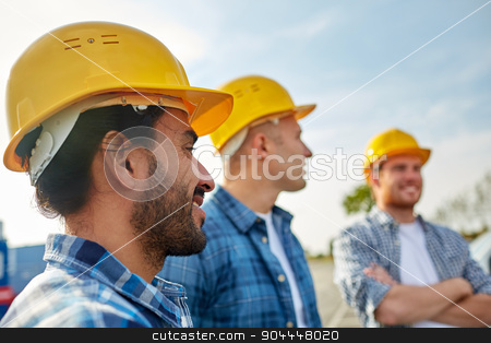 To use this stock image in your creative project, please select the size you need over to the right and click the "Add to Cart" button.
Your downloaded image will come with the Cutcaster watermark removed so don’t worry about the watermark you see on this page. group of smiling builders in hardhats outdoors stock photo, business, building, teamwork and people concept - group of smiling builders in hardhats at construction site by Syda Productions