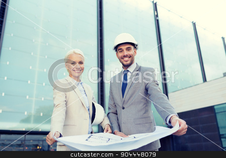 To use this stock image in your creative project, please select the size you need over to the right and click the "Add to Cart" button.
Your downloaded image will come with the Cutcaster watermark removed so don’t worry about the watermark you see on this page. smiling businessmen with blueprint and helmets stock photo, business, partnership, architecture and people concept - smiling businessman and businesswoman with blueprint and helmets on city street by Syda Productions