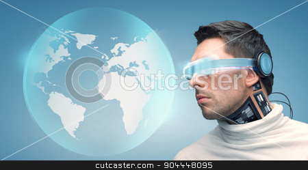 To use this stock image in your creative project, please select the size you need over to the right and click the "Add to Cart" button.
Your downloaded image will come with the Cutcaster watermark removed so don’t worry about the watermark you see on this page. man with futuristic glasses and sensors stock photo, people, technology, future and progress - man with futuristic glasses and microchip implant or sensors over blue background and earth globe hologram by Syda Productions