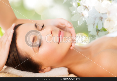 To use this stock image in your creative project, please select the size you need over to the right and click the "Add to Cart" button.
Your downloaded image will come with the Cutcaster watermark removed so don’t worry about the watermark you see on this page. beautiful woman in spa salon having facial massage stock photo, spa, beauty, people and body care concept - beautiful woman getting face treatment over green natural background by Syda Productions