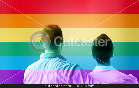 To use this stock image in your creative project, please select the size you need over to the right and click the "Add to Cart" button.
Your downloaded image will come with the Cutcaster watermark removed so don’t worry about the watermark you see on this page. close up of male gay couple over rainbow flag stock photo, people, homosexuality, same-sex marriage, gay and love concept - close up of happy male gay couple or friends hugging from back over rainbow flag stripes background by Syda Productions