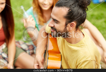 To use this stock image in your creative project, please select the size you need over to the right and click the "Add to Cart" button.
Your downloaded image will come with the Cutcaster watermark removed so don’t worry about the watermark you see on this page. happy man with friends playing guitar at camping stock photo, travel, tourism, hike, leisure and people concept - happy man with friends playing guitar at camping by Syda Productions