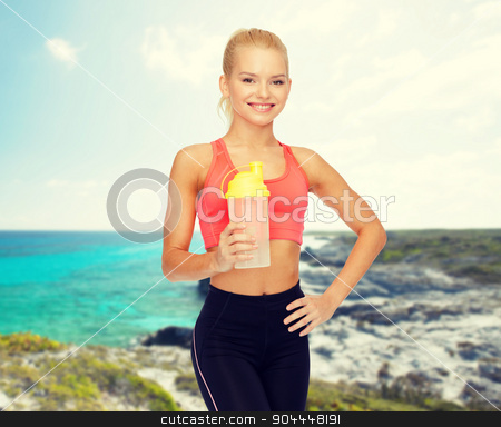 To use this stock image in your creative project, please select the size you need over to the right and click the "Add to Cart" button.
Your downloaded image will come with the Cutcaster watermark removed so don’t worry about the watermark you see on this page. smiling sporty woman with protein shake bottle stock photo, sport, fitness and diet concept - smiling sporty woman with protein shake bottle by Syda Productions