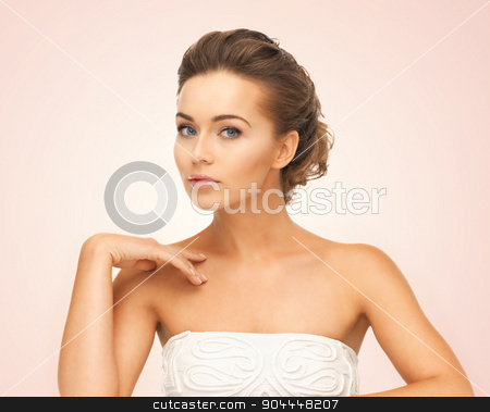 To use this stock image in your creative project, please select the size you need over to the right and click the "Add to Cart" button.
Your downloaded image will come with the Cutcaster watermark removed so don’t worry about the watermark you see on this page. beautiful woman stock photo, close up of face and hands of beautiful young woman by Syda Productions