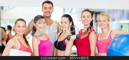 To use this stock image in your creative project, please select the size you need over to the right and click the "Add to Cart" button.
Your downloaded image will come with the Cutcaster watermark removed so don’t worry about the watermark you see on this page. group of smiling people in the gym stock photo, fitness, sport, training, gym and lifestyle concept - group of smiling people in the gym by Syda Productions