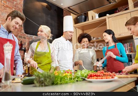 To use this stock image in your creative project, please select the size you need over to the right and click the "Add to Cart" button.
Your downloaded image will come with the Cutcaster watermark removed so don’t worry about the watermark you see on this page. happy friends and chef cook cooking in kitchen stock photo, cooking class, culinary, food and people concept - happy group of friends with male chef cook cooking and talking in kitchen by Syda Productions