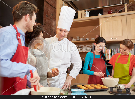 To use this stock image in your creative project, please select the size you need over to the right and click the "Add to Cart" button.
Your downloaded image will come with the Cutcaster watermark removed so don’t worry about the watermark you see on this page. happy friends and chef cook baking in kitchen stock photo, cooking class, culinary, bakery, food and people concept - happy group of friends and male chef cook baking in kitchen by Syda Productions