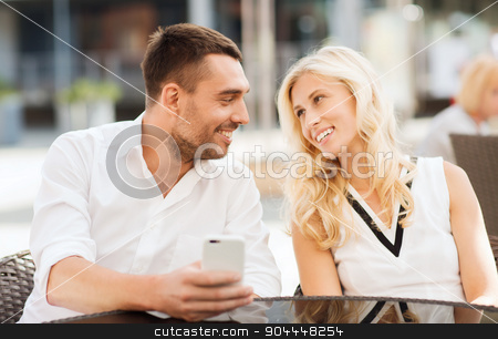 To use this stock image in your creative project, please select the size you need over to the right and click the "Add to Cart" button.
Your downloaded image will come with the Cutcaster watermark removed so don’t worry about the watermark you see on this page. happy couple with smatphone at city street cafe stock photo, love, date, technology, people and relations concept - smiling happy couple with smatphone at city street cafe by Syda Productions
