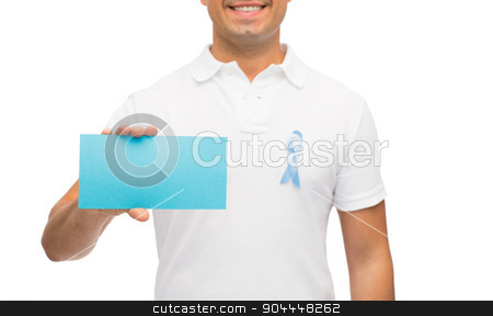 To use this stock image in your creative project, please select the size you need over to the right and click the "Add to Cart" button.
Your downloaded image will come with the Cutcaster watermark removed so don’t worry about the watermark you see on this page. man with prostate cancer awareness ribbon and card stock photo, medicine, health care, gesture and people concept - close up of middle aged man in t-shirt with sky blue prostate cancer awareness ribbon holding blank paper card by Syda Productions
