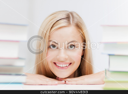 To use this stock image in your creative project, please select the size you need over to the right and click the "Add to Cart" button.
Your downloaded image will come with the Cutcaster watermark removed so don’t worry about the watermark you see on this page. student with stack of books stock photo, picture of smiling student with stack of books by Syda Productions