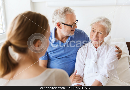 To use this stock image in your creative project, please select the size you need over to the right and click the "Add to Cart" button.
Your downloaded image will come with the Cutcaster watermark removed so don’t worry about the watermark you see on this page. happy family visiting senior woman at hospital stock photo, medicine, support, family health care and people concept - happy senior man and young woman visiting and cheering her grandmother lying in bed at hospital ward by Syda Productions