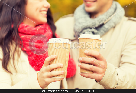 To use this stock image in your creative project, please select the size you need over to the right and click the "Add to Cart" button.
Your downloaded image will come with the Cutcaster watermark removed so don’t worry about the watermark you see on this page. smiling couple with coffee cups in autumn park stock photo, love, season, drinks and people concept - close up of happy smiling couple with coffee cups in autumn park by Syda Productions