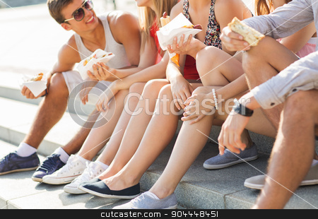 To use this stock image in your creative project, please select the size you need over to the right and click the "Add to Cart" button.
Your downloaded image will come with the Cutcaster watermark removed so don’t worry about the watermark you see on this page. happy friends eating takeout fast food in city stock photo, friendship, leisure, summer, fast food and people concept - group of happy friends eating hot dogs and sandwiches on city square by Syda Productions