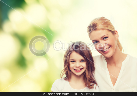 To use this stock image in your creative project, please select the size you need over to the right and click the "Add to Cart" button.
Your downloaded image will come with the Cutcaster watermark removed so don’t worry about the watermark you see on this page. smiling mother and little girl stock photo, family, childhood, happiness, ecology and people - smiling mother and little girl over green background by Syda Productions