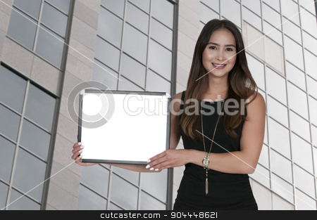 To use this stock image in your creative project, please select the size you need over to the right and click the "Add to Cart" button.
Your downloaded image will come with the Cutcaster watermark removed so don’t worry about the watermark you see on this page. Woman Holding a Blank Sign stock photo, Beautiful young woman holding up a blank sign by Robert Byron