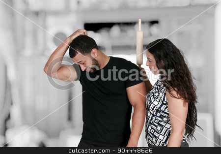 To use this stock image in your creative project, please select the size you need over to the right and click the "Add to Cart" button.
Your downloaded image will come with the Cutcaster watermark removed so don’t worry about the watermark you see on this page. Woman Chasing man with Rolling Pin stock photo, Beautiful young woman holding a rolling pin with a man by Robert Byron