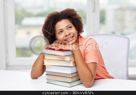 To use this stock image in your creative project, please select the size you need over to the right and click the "Add to Cart" button.
Your downloaded image will come with the Cutcaster watermark removed so don’t worry about the watermark you see on this page. happy african student girl with books at home stock photo, education, school, knowledge and people concept - happy smiling african american student girl with books sitting at table and dreaming at home by Syda Productions