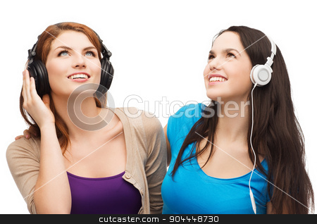 To use this stock image in your creative project, please select the size you need over to the right and click the "Add to Cart" button.
Your downloaded image will come with the Cutcaster watermark removed so don’t worry about the watermark you see on this page. two smiling teenagers with headphones stock photo, music and technology concept - two smiling teenagers with headphones looking up by Syda Productions