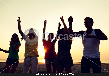 To use this stock image in your creative project, please select the size you need over to the right and click the "Add to Cart" button.
Your downloaded image will come with the Cutcaster watermark removed so don’t worry about the watermark you see on this page. smiling friends dancing on summer beach stock photo, friendship, summer vacation, holidays, party and people concept - group of smiling friends dancing on beach by Syda Productions