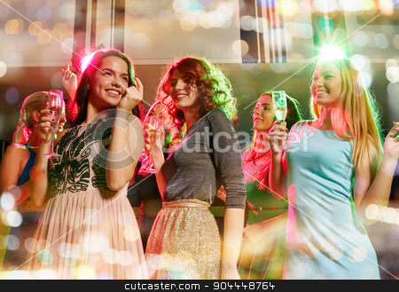 To use this stock image in your creative project, please select the size you need over to the right and click the "Add to Cart" button.
Your downloaded image will come with the Cutcaster watermark removed so don’t worry about the watermark you see on this page. smiling friends with glasses of champagne in club stock photo, party, holidays, celebration, nightlife and people concept - smiling friends with glasses of champagne dancing in club by Syda Productions