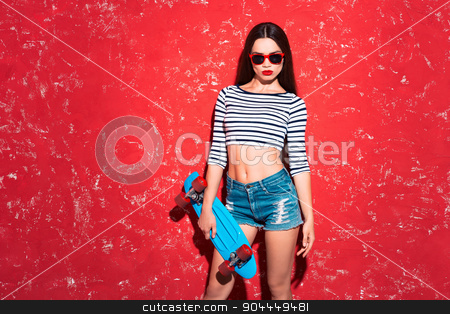 To use this stock image in your creative project, please select the size you need over to the right and click the "Add to Cart" button.
Your downloaded image will come with the Cutcaster watermark removed so don’t worry about the watermark you see on this page. Creative concept of beautiful sexy girl stock photo, Colorful picture of beautiful slim young woman with long hair on red background. Girl with sunglasses looking at camera and holding skateboard by Dmytro Sidelnikov