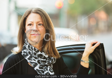 To use this stock image in your creative project, please select the size you need over to the right and click the "Add to Cart" button.
Your downloaded image will come with the Cutcaster watermark removed so don’t worry about the watermark you see on this page. Confident Woman Near Car stock photo, Confident European business woman standing near car door by Scott Griessel