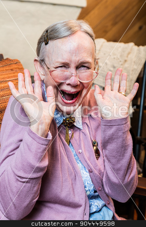To use this stock image in your creative project, please select the size you need over to the right and click the "Add to Cart" button.
Your downloaded image will come with the Cutcaster watermark removed so don’t worry about the watermark you see on this page. Happy Old Woman stock photo, Happy old woman with a hands up gesture by Scott Griessel