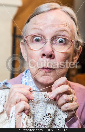 To use this stock image in your creative project, please select the size you need over to the right and click the "Add to Cart" button.
Your downloaded image will come with the Cutcaster watermark removed so don’t worry about the watermark you see on this page. Funny Elderly Woman with Crochet stock photo, Elder woman with crochet and funny facial expression by Scott Griessel