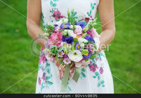 To use this stock image in your creative project, please select the size you need over to the right and click the "Add to Cart" button.
Your downloaded image will come with the Cutcaster watermark removed so don’t worry about the watermark you see on this page. Bride holding beautiful wedding bouquet stock photo, Bride holding beautiful wedding bouquet. by timonko