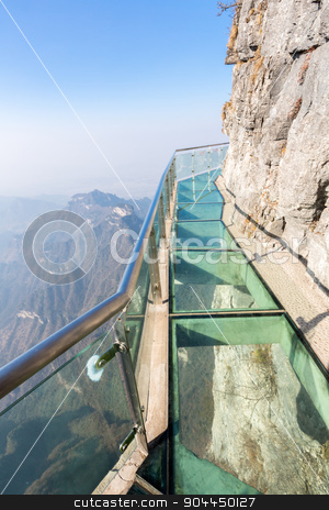 To use this stock image in your creative project, please select the size you need over to the right and click the "Add to Cart" button.
Your downloaded image will come with the Cutcaster watermark removed so don’t worry about the watermark you see on this page. Tianmen Mountain China stock photo, Glass sky walk at Tianmenshan Tianmen Mountain Zhangjiajie China by Vichaya Kiatying-Angsulee
