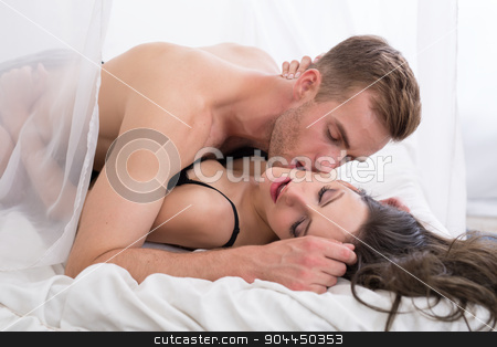 To use this stock image in your creative project, please select the size you need over to the right and click the "Add to Cart" button.
Your downloaded image will come with the Cutcaster watermark removed so don’t worry about the watermark you see on this page. Young lovers lie in bed. stock photo, Young lovers lie in bed. The guy is on top by bezikus