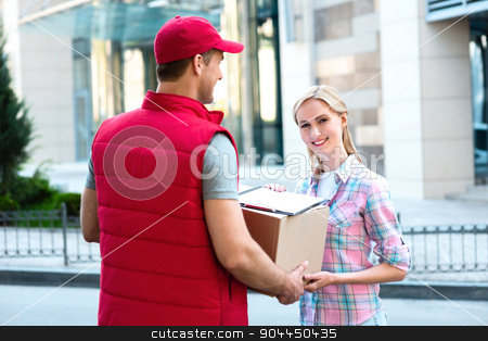 To use this stock image in your creative project, please select the size you need over to the right and click the "Add to Cart" button.
Your downloaded image will come with the Cutcaster watermark removed so don’t worry about the watermark you see on this page. First class delivery service. Courier Delivering Package By Van. stock photo, Colorful picture of courier delivers package for woman. Woman accepts the parcel and smiling. by Dmytro Sidelnikov