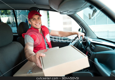 To use this stock image in your creative project, please select the size you need over to the right and click the "Add to Cart" button.
Your downloaded image will come with the Cutcaster watermark removed so don’t worry about the watermark you see on this page. Courier Delivering Package By Van stock photo, Colorful picture of courier delivers package. Man is sitting in the car, looking at camera and smiling. by Dmytro Sidelnikov