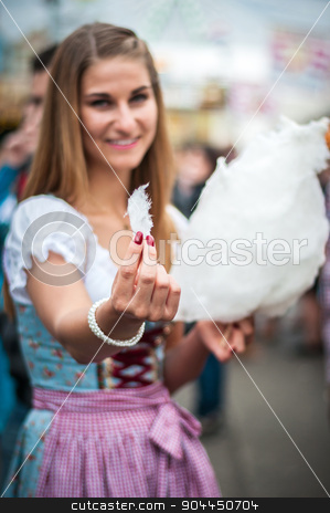 To use this stock image in your creative project, please select the size you need over to the right and click the "Add to Cart" button.
Your downloaded image will come with the Cutcaster watermark removed so don’t worry about the watermark you see on this page. Attractive young woman wearing a traditional Dirndl dress with cotton candy floss at the Oktoberfest. stock photo, Beautiful young smiling woman wearing a traditional Dirndl dress with cotton candy floss at the Oktoberfest. by uleiber